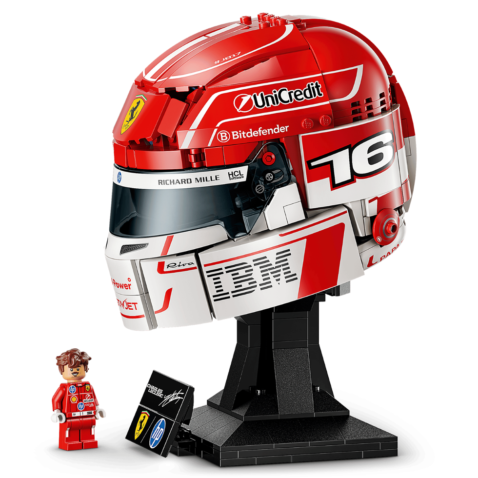 lego model of a red racing helmet with a mini figure