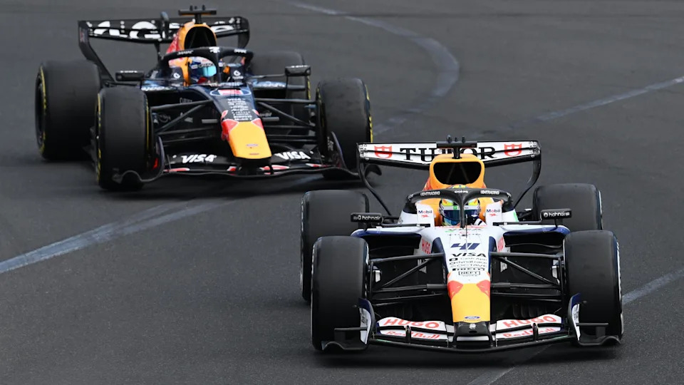 Racing Bulls' Arvid Lindblad ahead of Red Bull's Max Verstappen during the Australian Grand Prix