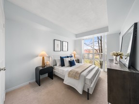 The two-plus-one-bedroom suite enjoys a corner location with a view of a park and has a split-bedroom plan.