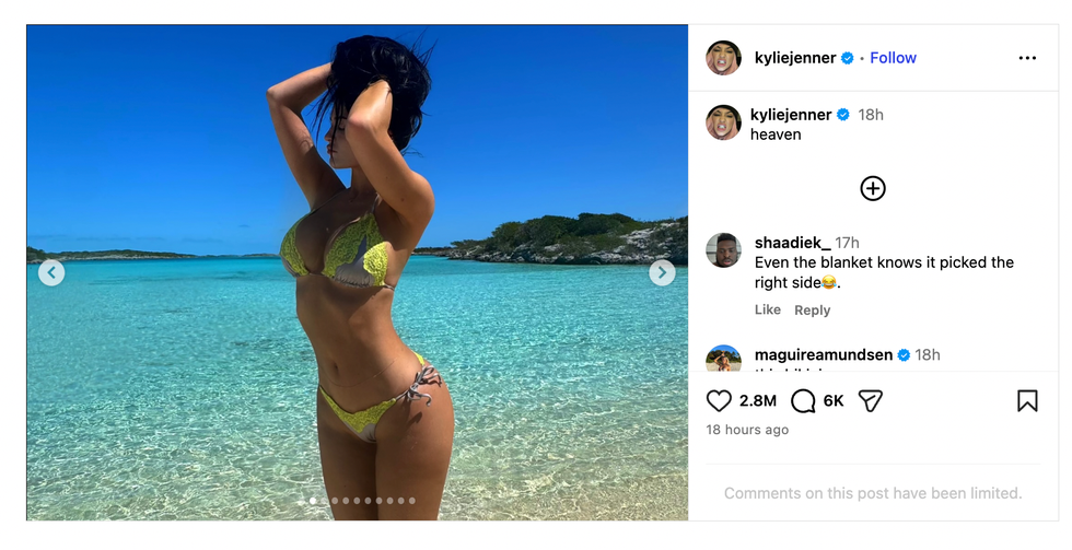 Woman in a swimsuit posing in clear blue water under a bright sky. Woman in a swimsuit posing in clear blue water under a bright sky.