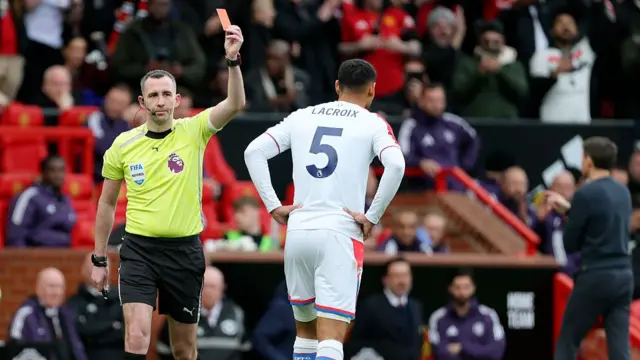 Maxence Lacroix of Crystal Palace is shown a Red card