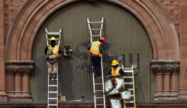 Photos: The Bay's iconic sign dismantled in downtown Montreal