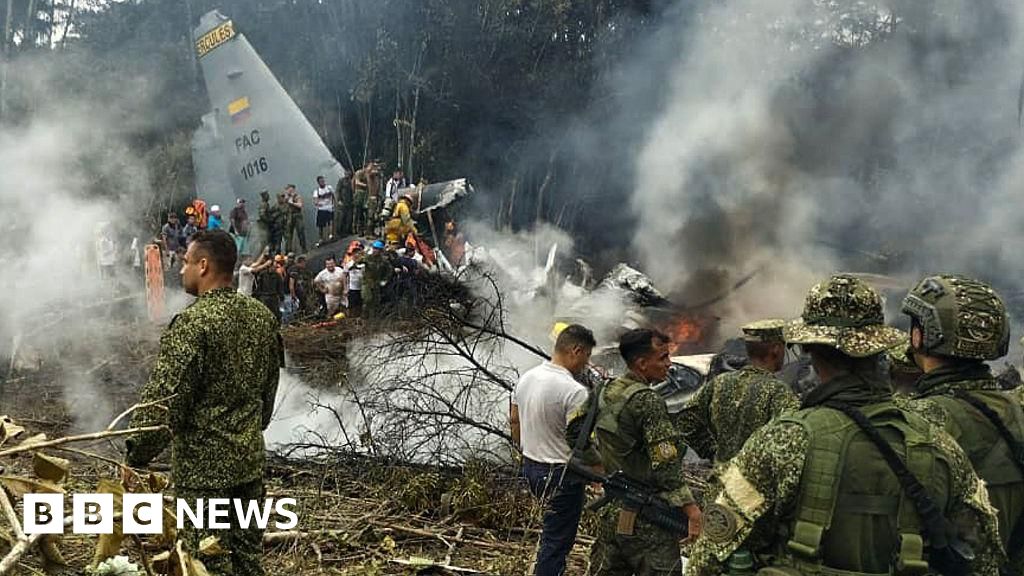 Colombian Air Force plane crashes with scores of soldiers on board - BBC