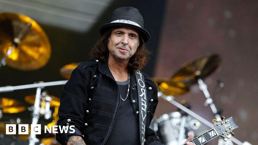 Motörhead guitarist Phil Campbell dies aged 64 after 'courageous battle' - BBC