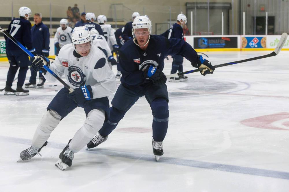 MIKE DEAL / FREE PRESS
Winnipeg Jets’ Walker Duehr (71) and Jonathan Toews (19) during training camp at Hockey For All Centre in September.