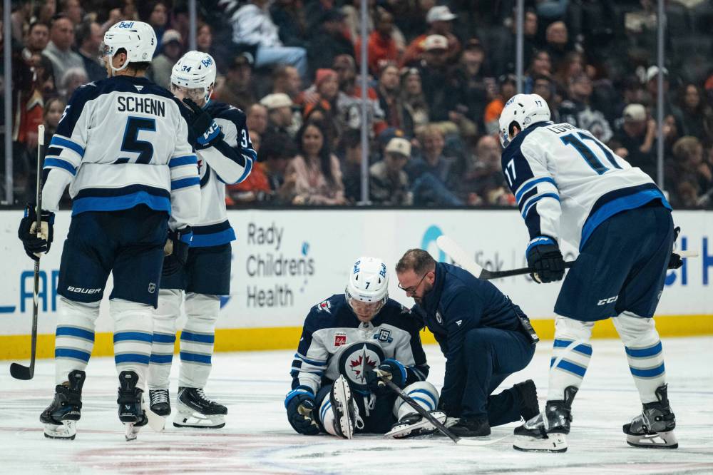 KYUSUNG GONG / THE ASSOCIATED PRESS
Winnipeg Jets centre Vladislav Namestnikov is checked for an injury during the second period against the Anaheim Ducks, Friday in Anaheim, Calif.
