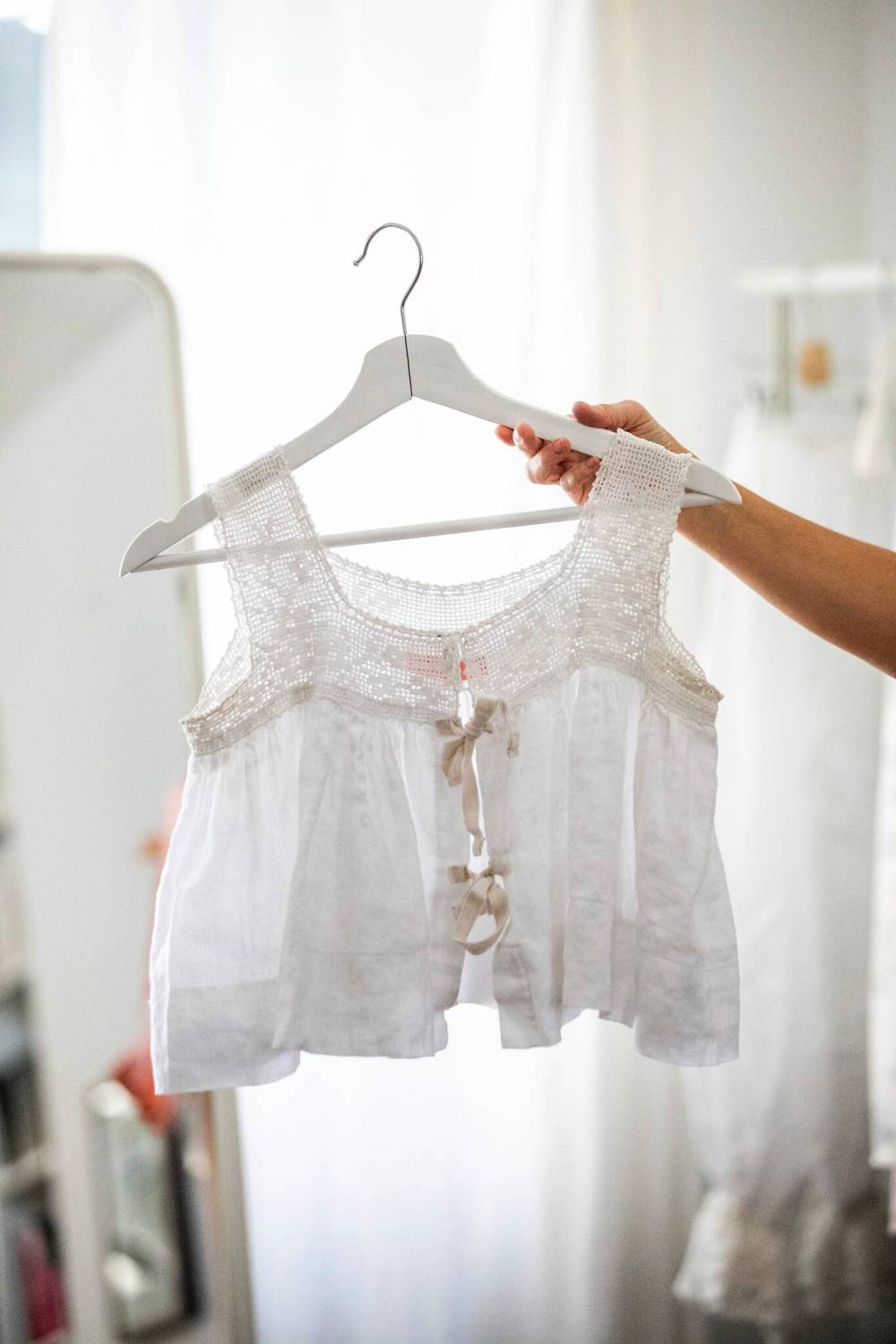 MIKAELA MACKENZIE / FREE PRESS
The Esme Flowy Top, a white portofino linen with antique inspired lace.