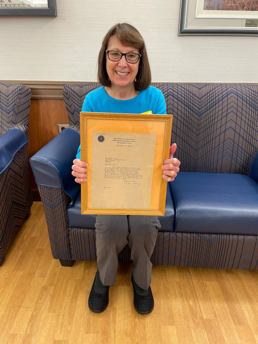 Photo by Simon Fuller
Heppner shows off a mysterious letter signed by former FBI director J. Edgar Hoover that was found at the home during recent renovations. Anyone with information on the origins of the letter, written to a man named Willy Finke in Germany in 1945, should get in touch with Heppner.