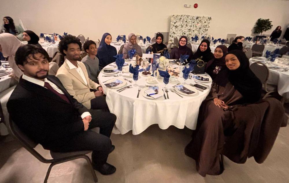 JOHN LONGHURST / FREE PRESS
Youth from the Winnipeg Ethiopian Canadian Muslim Community Association attend the March 8 grand iftar.