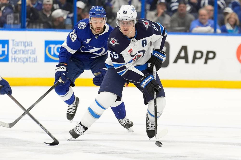 Chris O’Meara / THE ASSOCIATED PRESS FILES
Winnipeg Jets forward Mark Scheifele (55) is on pace to eclipse his career-best 87 points this season and may hit the century mark for the first time in his career.