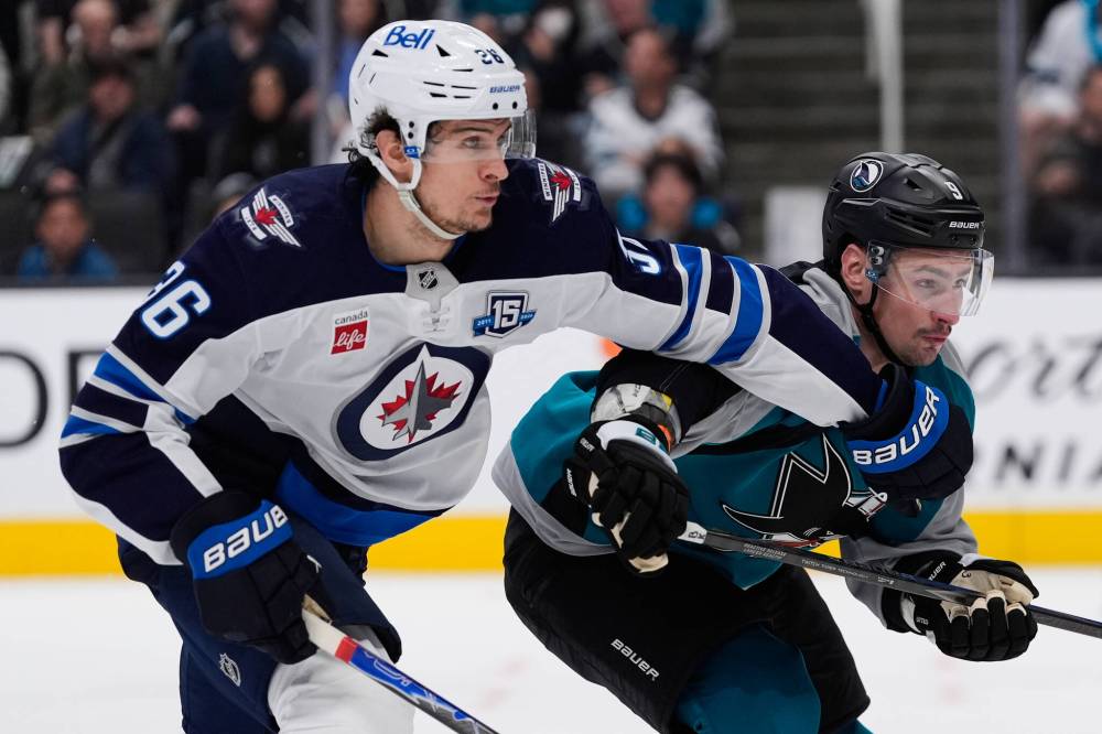 Godofredo A. Vásquez / THE ASSOCIATED PRESS FILES
Elevating Winnipeg Jets forward Morgan Barron (left) would make plenty of sense as the team pushes for the final Western Conference wild-card spot.