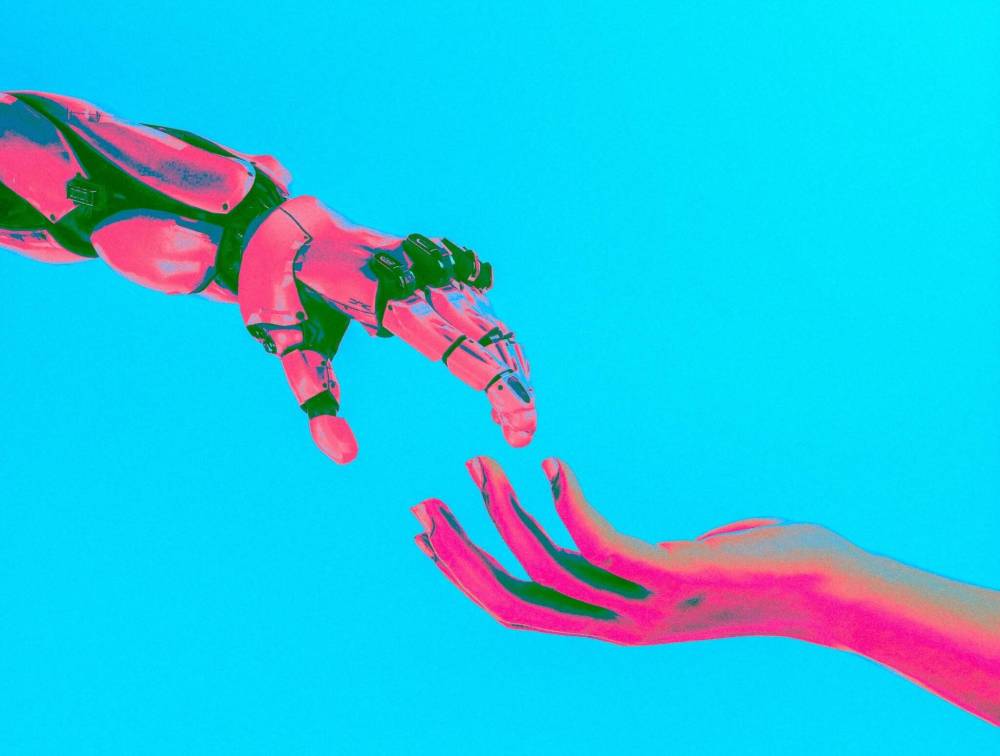 Cash Macanaya / Unsplash
Relationships between humans and AI are becoming increasingly complex, particularly in the workplace.