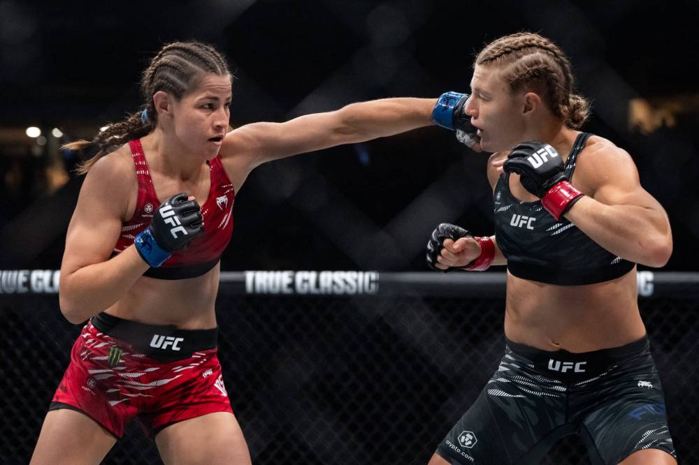 ETHAN CAIRNS / THE CANADIAN PRESS FILES
Canadian Jasmine Jasudavicius (left) writes the next chapter of her unlikely mixed martial arts career in Winnipeg April 18 when she clashes with Brazil’s Karine Silva in UFC Fight Night at Canada Life Centre.