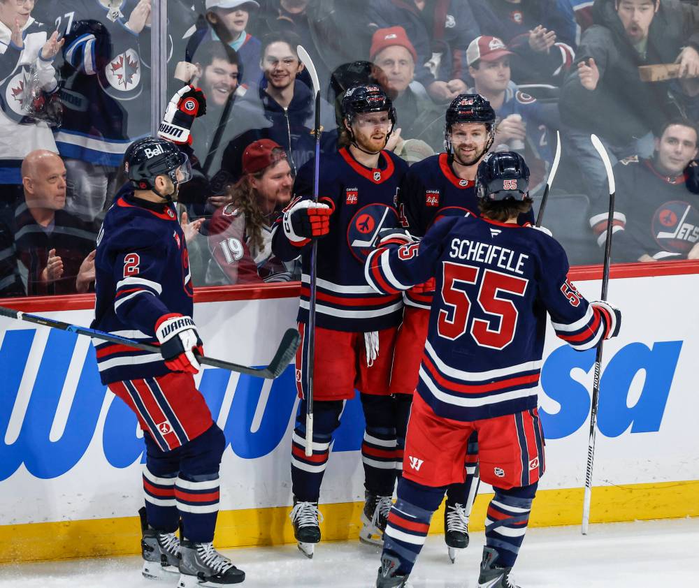 JOHN WOODS / THE CANADIAN PRESS
Winnipeg Jets players celebrate Kyle Connor’s (81) goal against the Colorado Avalanche during second period action in Winnipeg on Saturday.
