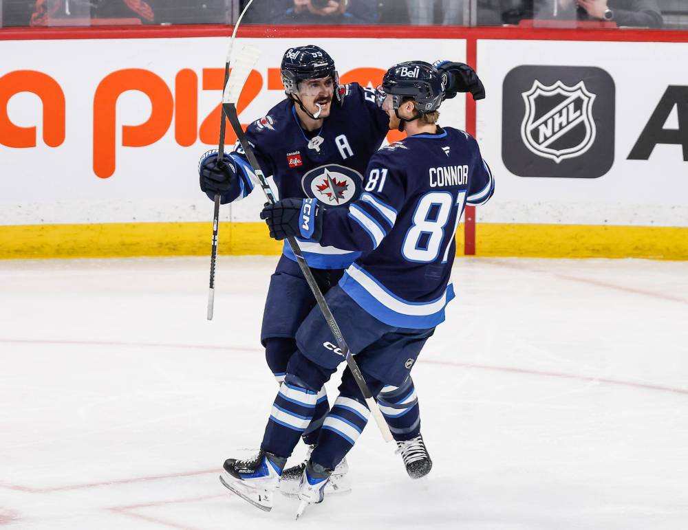 JOHN WOODS / THE CANADIAN PRESS FILES
Winnipeg Jets forwards Mark Scheifele (left) and Kyle Connor have been terrific all season. The dynamic duo currently leads the team in goals with 31 apiece.