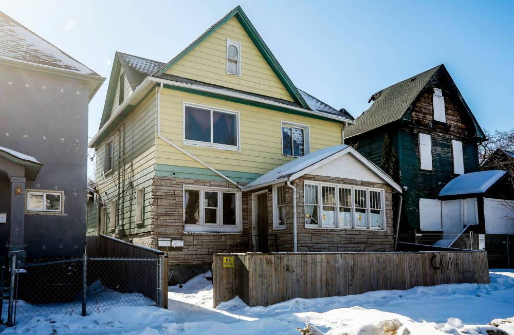 JOHN WOODS / FREE PRESS
The house at 340 Boyd Ave. where the fatal shootings occurred.