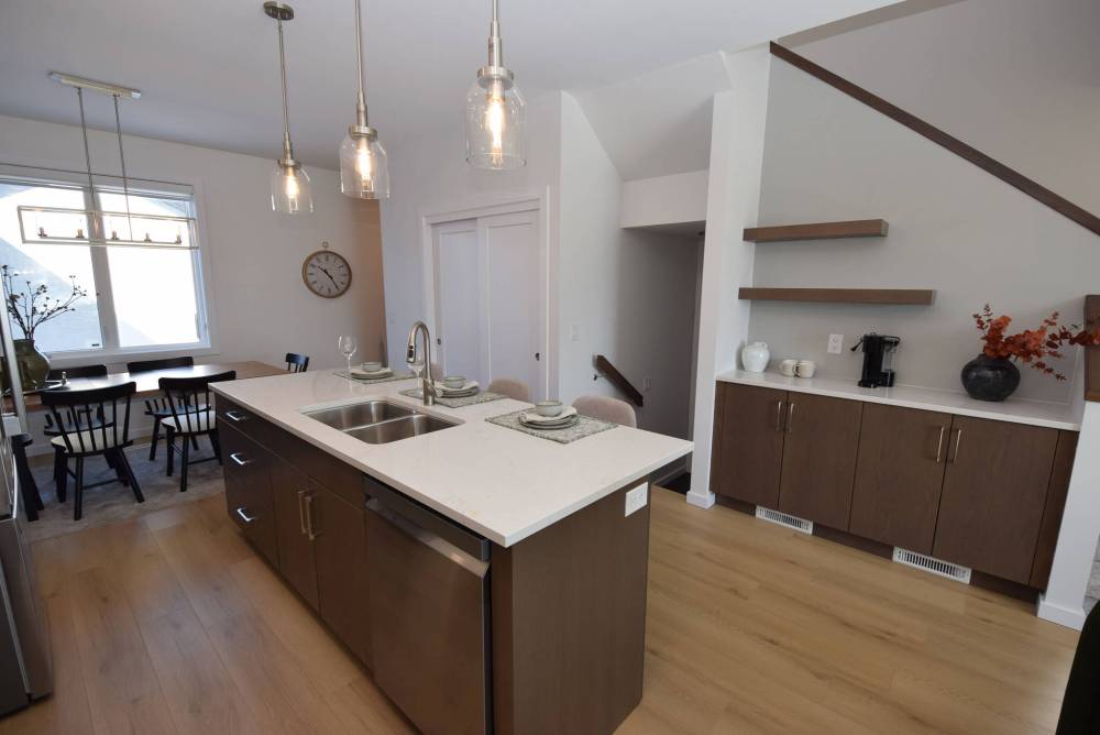 TODD LEWYS / FREE PRESS
A handy coffee bar (or sideboard) adds an extra level of utility to the already functional and beautiful island kitchen.