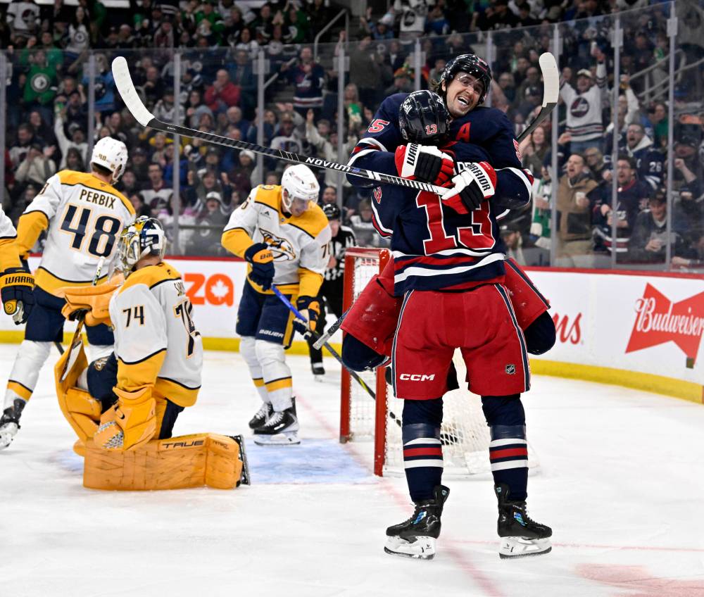 Fred Greenslade / THE CANADIAN PRESS
Winnipeg Jets’ Gabriel Vilardi celebrates his goal against the Nashville Predators with Mark Scheifele during the second period.