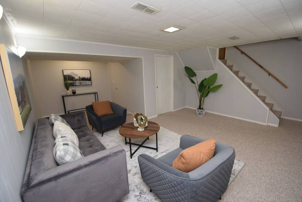 Families will love the space and adaptability of the large lower-level rec room.