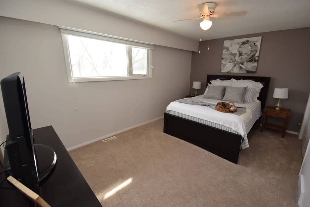 Todd Lewys / Free Press
The spacious primary bedroom is a cosy retreat.