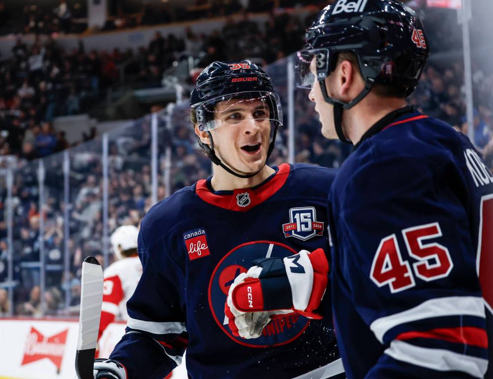 John Woods / THE CANADIAN PRESS FILES
Winnipeg Jets centre Morgan Barron (left) sees that his role on the club is evolving to mentorship, especially alongside his pair of young wingers Brad Lambert and Isak Rosen.
