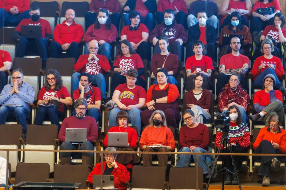 MIKE DEAL / FREE PRESS
Road safety advocates wearing red shirts to honour crash victim Rob Jenner fill the gallery at city hall for the vote on the speed limit change on Wellington Crescent.
