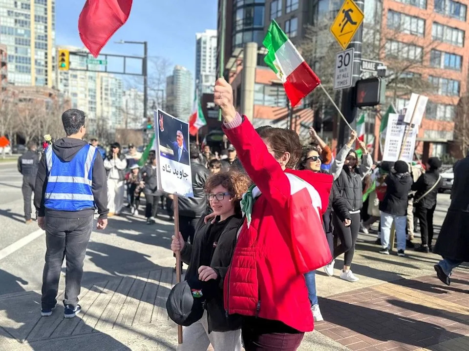  Iranian Canadians and supporters rally in Vancouver after news that Iran’s supreme leader is dead Saturday.