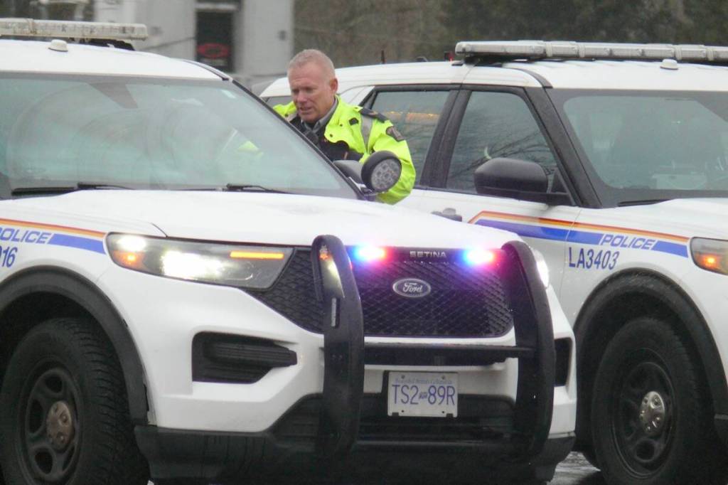 Langley RCMP officers on scene at a collision in January of 2026. (Dan Ferguson/Black Press Media)