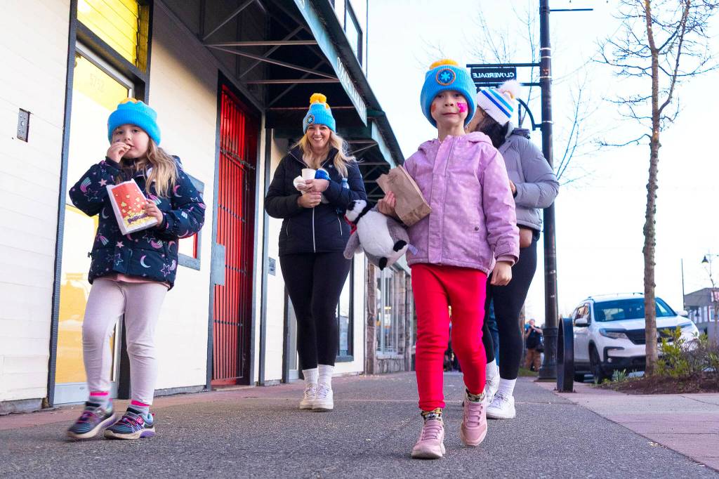 Participants in the Coldest Night of the Year fundraiser walk the streets of Cloverdale Saturday night (Feb. 28) during the perambulating portion of the two-month fundraising drive. (Photo: Jason Sveinson/Cloverdale Reporter)