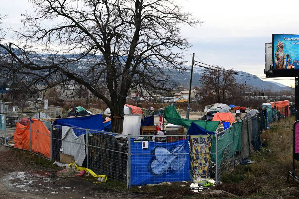 The encampment at Fairview Avenue and Highway 97 in Penticton has been a driver of conversations and concerns throughout 2025. (Brennan Phillips / Western News)