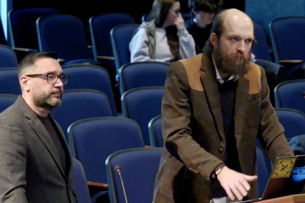 Sebastian Sajda (podium) and Tauseef Wairaich of Surrey&rsquo;s Environment and Climate Change Committee presenting before council-in-committee. (Screen shot)