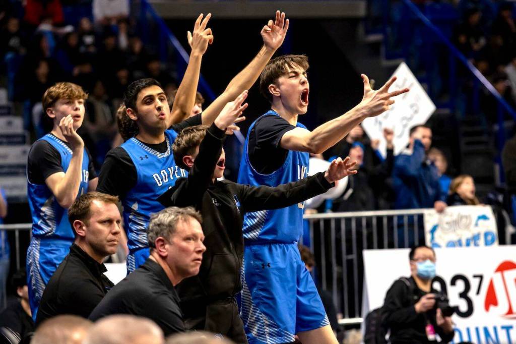 Dover Bay Dolphins players at the 2025 BC School Sports Boys Basketball Provincial Championships at Langley Events Centre. (Contributed/Garrett James, Langley Events Centre photo)