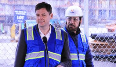 B.C. premier David Eby, flanked by Surrey-Fleetwood MLA Jagrup Brar, gives remarks about the construction progress on the new Cloverdale hospital March 6. Eby was in Surrey to mark the &ldquo;halfway milestone,&rdquo; as he said, of the construction phase of the hospital building. (Photo: Malin Jordan/Cloverdale Reporter)