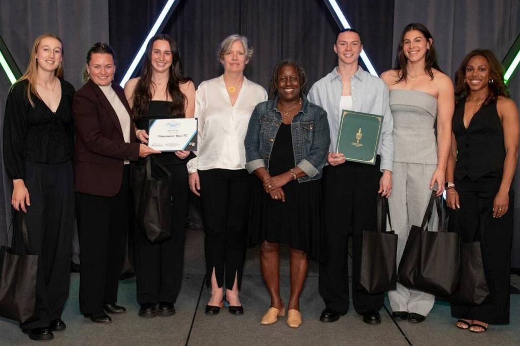 Vancouver Rise FC players and head coach Anja Heiner-Møller pose for a photo with award presenters at the Sport BC Athlete of the Year awards ceremony on March 5, 2026. (Vancouver Rise FC/ Facebook)