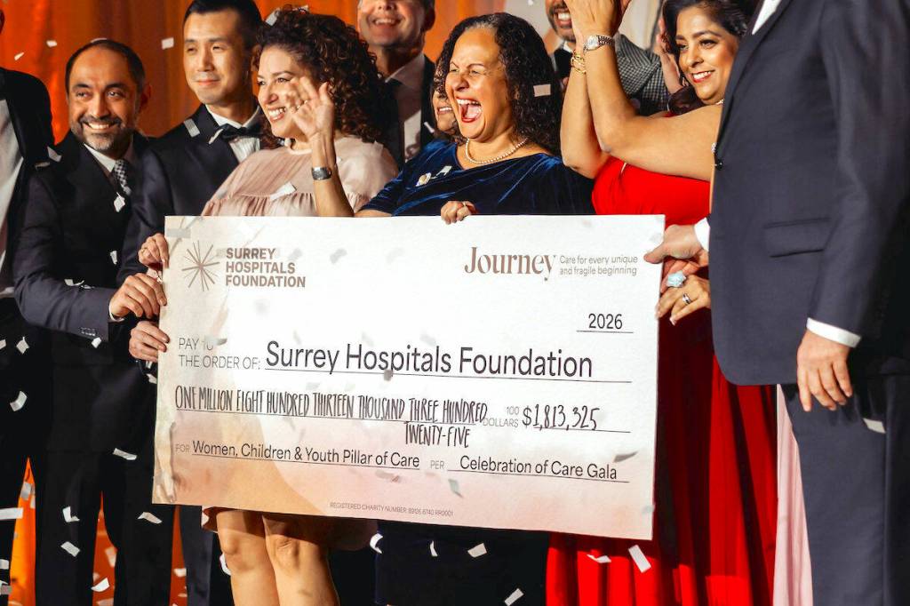 Oversized cheque shows fundraising total at Surrey Hospitals Foundation&rsquo;s Celebration of Care gala at Aria Banquet and Conference Centre in Surrey on Feb. 28, 2026. (Contributed/Diamonds Edge Photography)