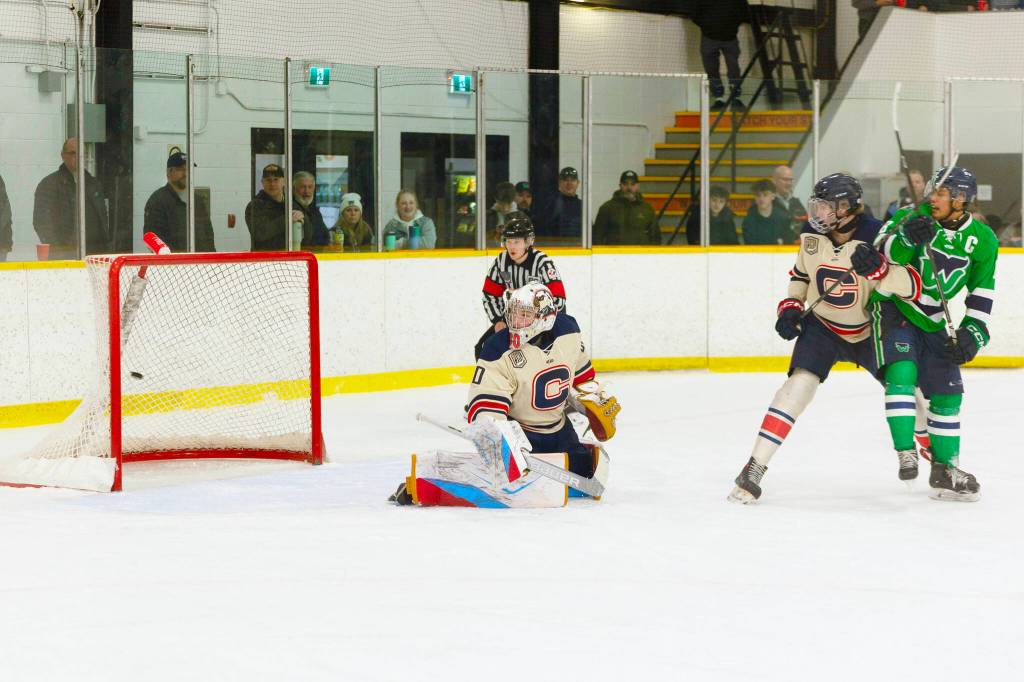The White Rock Whalers beat Cloverdale HC goaltender Blake Clark with a 1st period goal March 9 in Game 4 of the second round of the PJHL&rsquo;s 2026 Harold Brittain Conference playoffs. The Whalers capitalized on some early Cloverdale mistakes and ended up winning the contest 7-2 to take a 3-1 series lead. (Photo: Jason Sveinson/Cloverdale Reporter)
