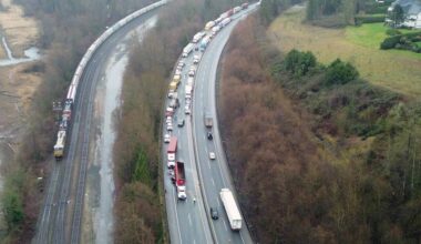 The crash involved two semi-trucks and two cars, with one car wedged under one of the semi-trucks while the other was partially under it. (1st Due Media/ Contributed to Surrey Now-Leader)