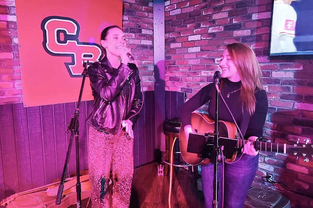 Annika Catharina (left) and Jada Leroux belt out tunes during the the 2026 Cloverdale Rodeo and Country Fair launch event, which was held in Cloverdale March 10. (Photo: Malin Jordan / Cloverdale Reporter)