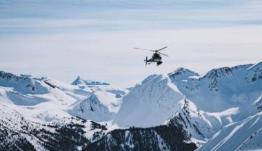 A helicopter with Great Canadian Heli-Skiing flies through the Columbia Mountains, in a photo posted May 28, 2020. (Photo courtesy Great Canadian Heli-Skiing/Facebook)