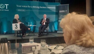 Surrey Mayor Brenda Locke listening to B.C. Transportation Minister Mike Farnworth and Surrey & White Rock Board of Trade CEO Josylyn Young discuss local transportation issues at a luncheon in Guildford on March 18. (Tom Zytaruk/Surrey Now-Leader)