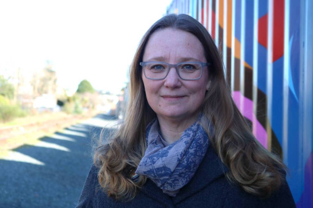 City of Langford Coun. Kimberly Guiry stands by Station Avenue in Langford on Feb. 14, 2023. (Bailey Moreton/Goldstream Gazette file photo)