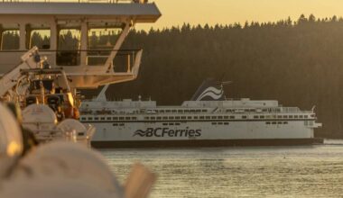 A ferry passes by approximately halfway through a BC Ferries sailing from Tsawwassen to Swartz Bay. (Arnold Lim/Black Press Media)