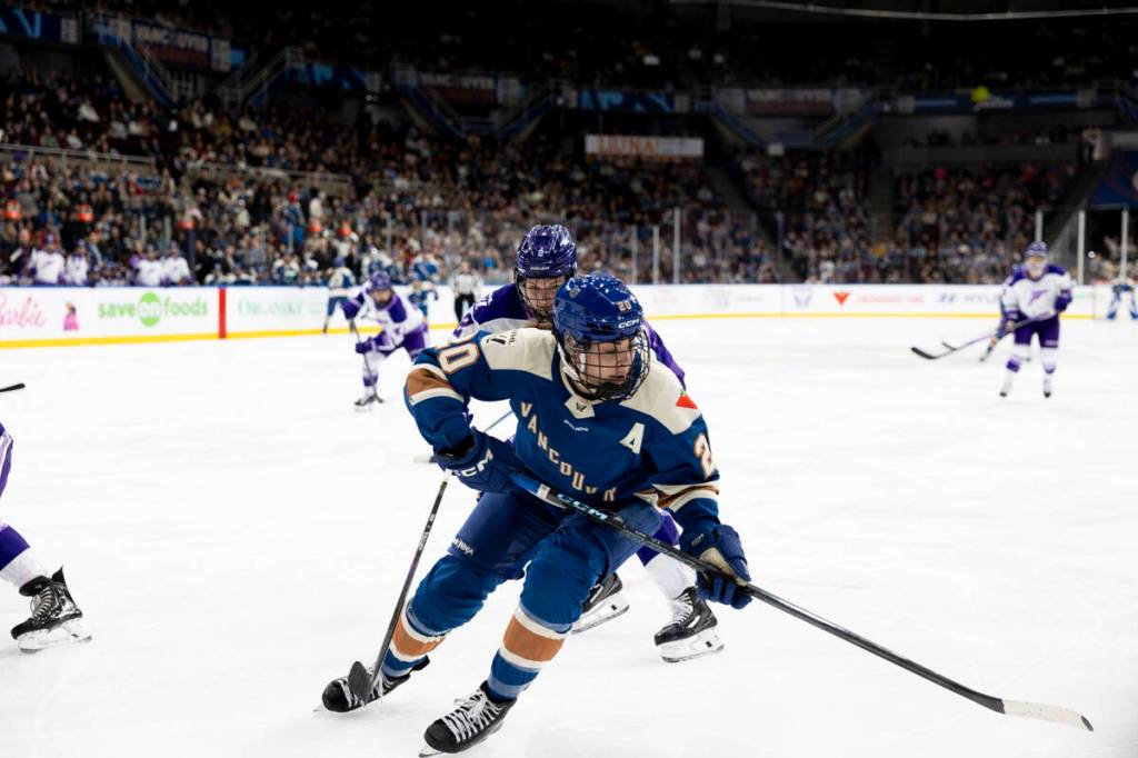 Sarah Nurse fights for the puck during the Vancouver Goldeneyes &rsquo; 3- 1 loss to the Minnesota Frost on Saturday, March 21, 2026, in Vancouver. (Anna Burns/ Surrey Now-Leader)