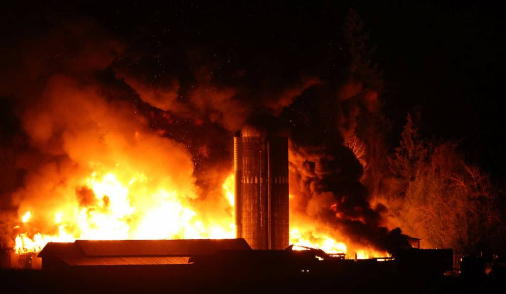 Neighbour Art Bandenieks said the area was rocked by &ldquo;a gigantic blast&rdquo; that sent a fireball and clouds of smoke billowing high into the air. (Art Bandenieks/Special to Langley Advance Times)