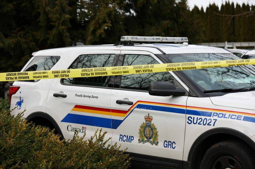 RCMP SPOSU officers were called to help BCEHS and Surrey Fire Services with an unresponsive injured man in the 9800 block of Foxglove Drive, Surrey on March 21. (Anna Burns/Surrey Now-Leader)