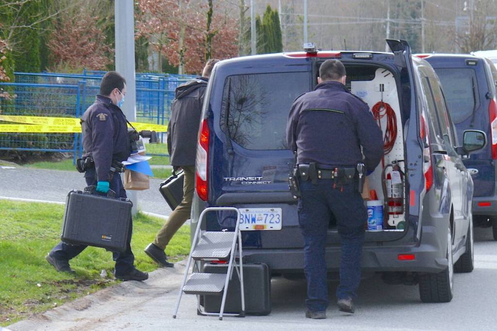 Investigators were at the scene of a shooting in the 5400-block of Production Boulevard, on the Surrey/Langley border. At least two bullet holes could be seen. (Dan Ferguson/Langley Advance Times)