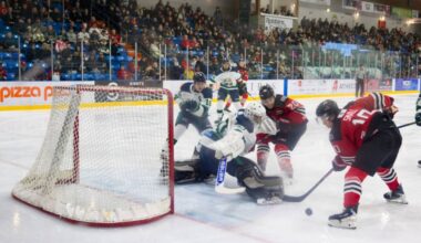 Players crowd the Surrey Eagles&rsquo; net at the Jan. 3, 2026 match between the teams. (Austin Kelly/Alberni Valley News)