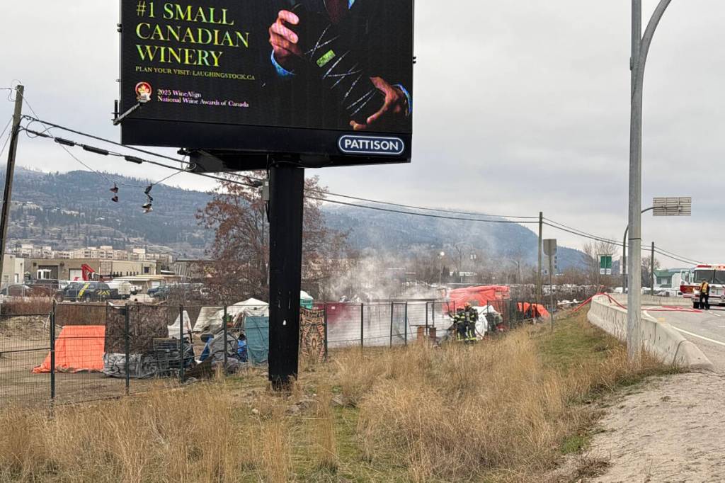 A fire breaks out at the Fairview homeless encampment in Penticton on Jan. 19, 2026. (Brennan Phillips/Penticton Western News)