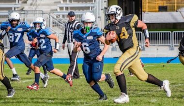 A North Surrey Eagles player carries the football during a game in November 2025. (Facebook.com/NSMFGameDay photo)
