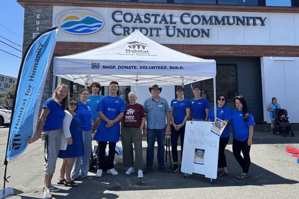 Habitat VIN & CCCU teams gather for a community BBQ at the opening of the new building in 2025. (Submitted/Coastal Community Credit Union)